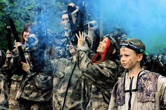 A kid enjoying laser tag on the weekend